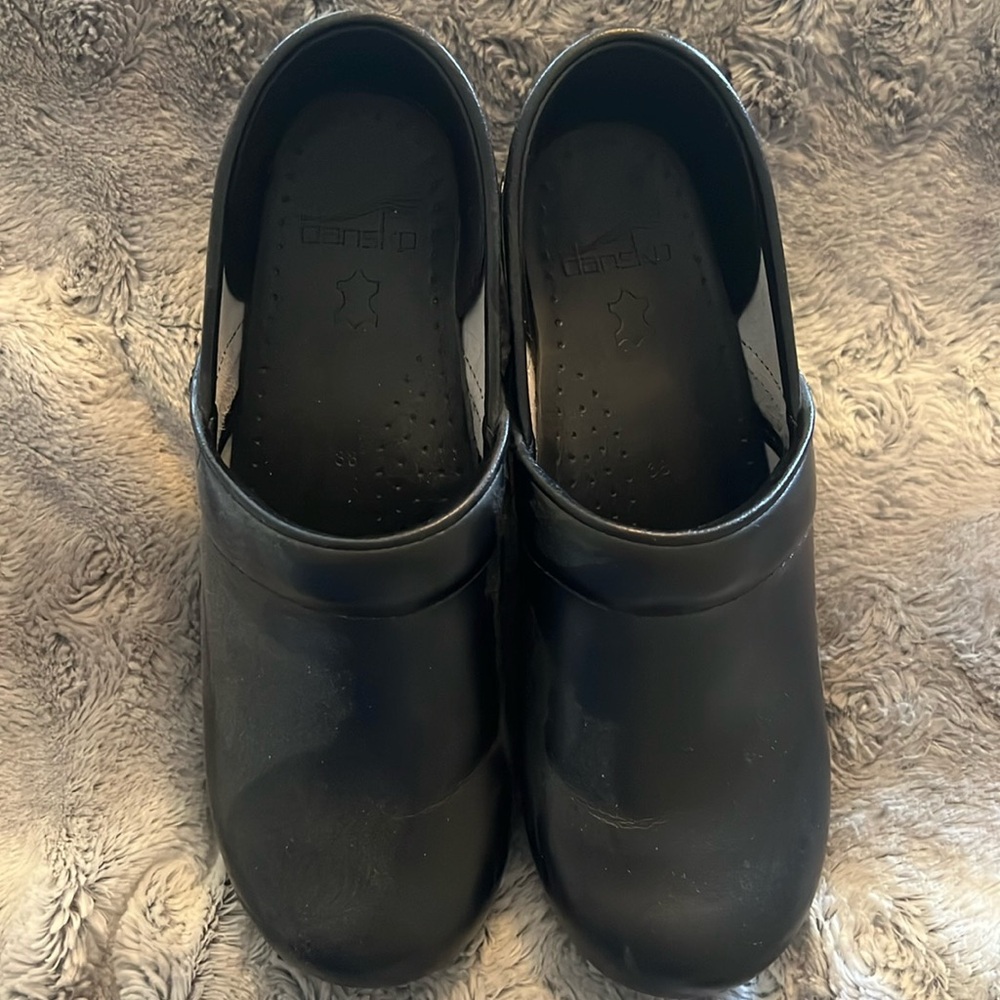 Dansko black leather clogs
